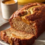 When Morning Cravings Hit: Peanut Butter Banana Bread to the Rescue 3 Close-up of peanut butter banana bread with a warm, inviting texture.
