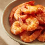 Air Fryer Uncooked Shrimp for a Quick Weeknight Dinner Fix 3 Close-up of uncooked shrimp ready for air fryer with bright lighting and clean background