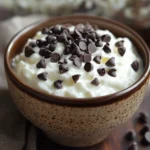 Close-up of chocolate chip muffins with yogurt on a clean background