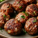 Close-up of delicious ground beef meatballs with a warm, inviting presentation.