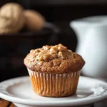 Close-up of peanut butter cookie muffins with a golden brown crust on a clean white background.
