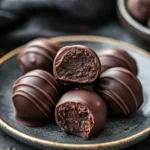 Close-up of shortbread cookie truffles on a clean background with warm lighting