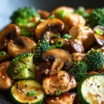 When Weeknight Cravings Hit: Skillet Chicken Hibachi to the Rescue 3 Close-up of skillet chicken hibachi with vibrant vegetables and a clean background.